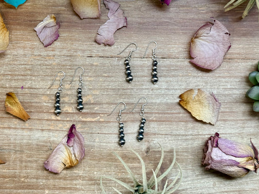 Sterling silver round pearl dangle earrings handmade by Colby Ogg and Addalie Ogg, 5–7 mm pearls, USA made