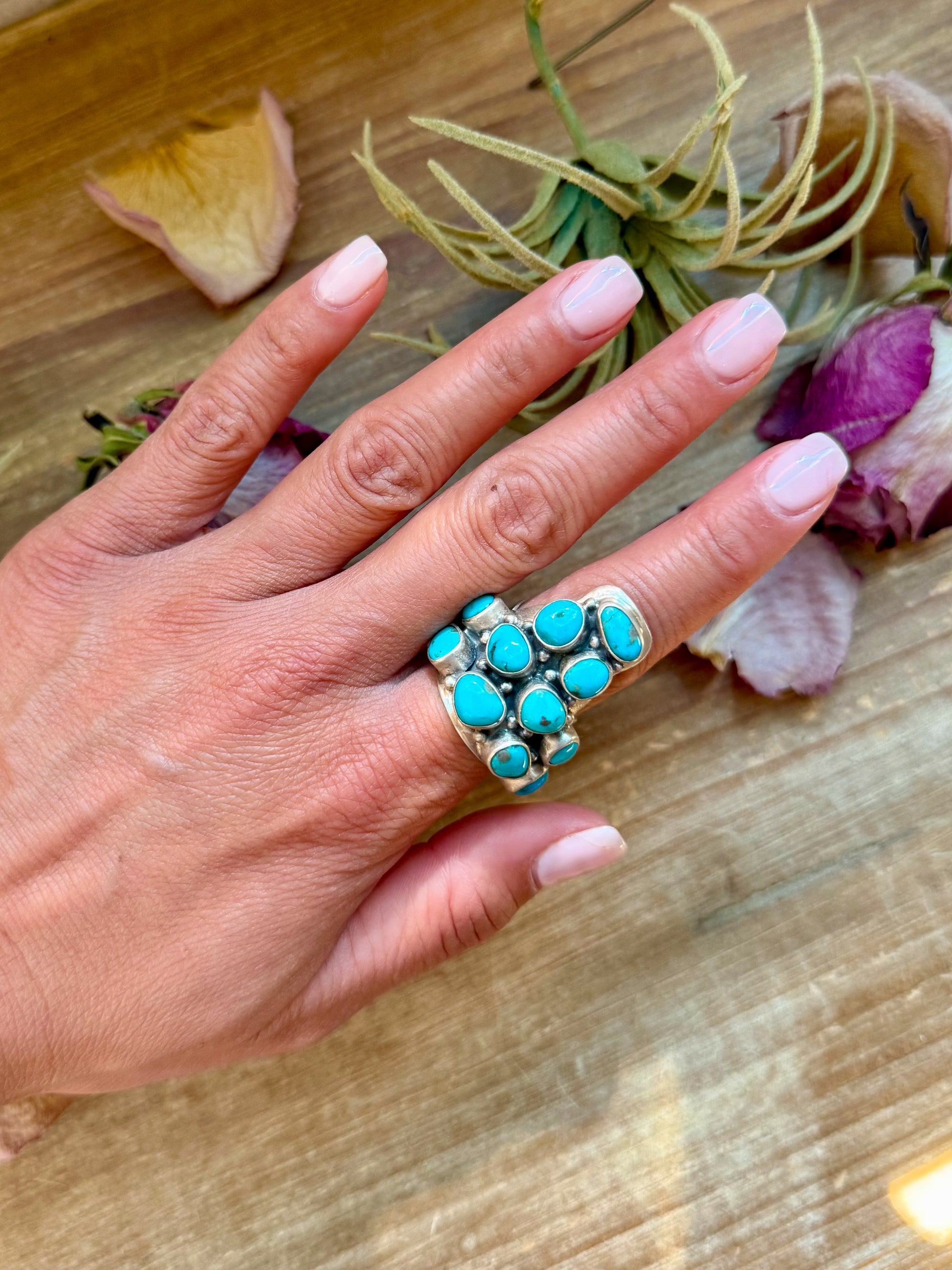 Adjustable longhorn-shaped sterling-silver ring with Kingman turquoise stone, stamped ZIA and Sterling, handmade in New Mexico USA