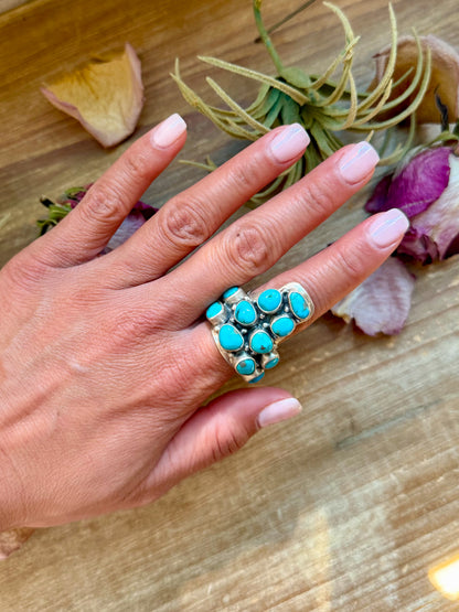 Adjustable longhorn-shaped sterling-silver ring with Kingman turquoise stone, stamped ZIA and Sterling, handmade in New Mexico USA