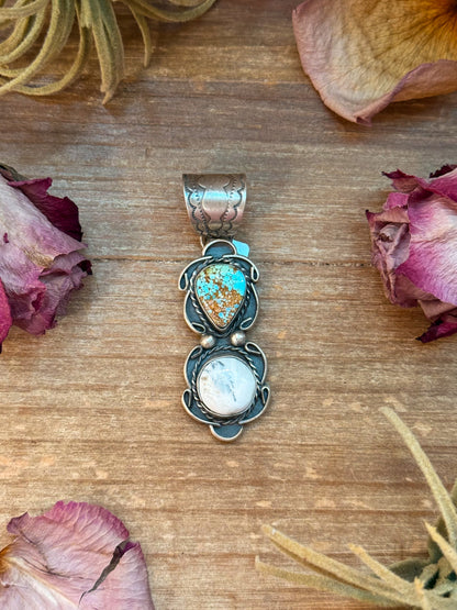 Sterling-silver pendant with Golden Hills turquoise and White Buffalo stones, 2.75 inches long by 1 inch wide, 12 mm bail, stamped Gilbert Nez, handmade in New Mexico USA