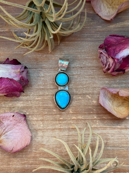 Sterling-silver pendant with Kingman turquoise, 2.5 inches long by 1 inch wide, 8 mm bail, stamped Sterling, handmade in the USA