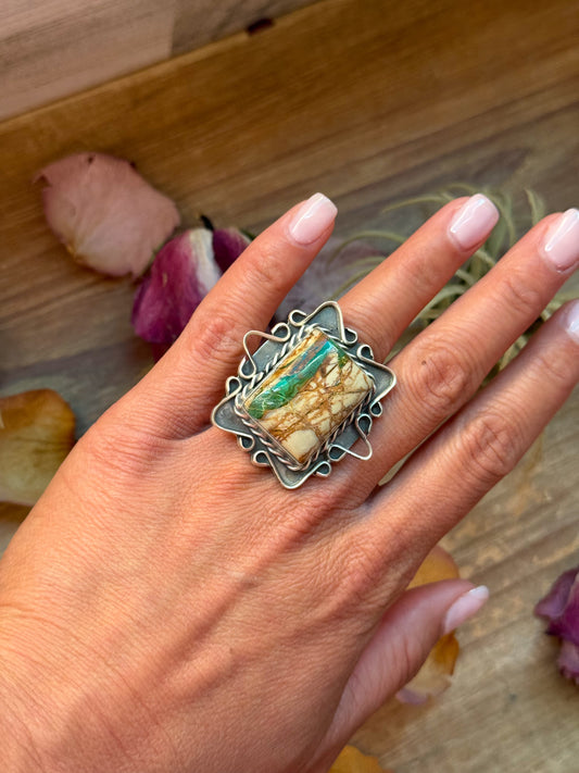 Size 6.5 sterling-silver ring with Ribbon Turquoise, wide band, stamped PN Philbert Nez and Sterling, handmade in the USA