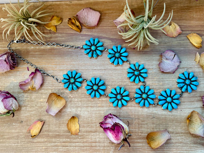 Native made sterling silver lariat necklace with Kingman turquoise flower design, 25 inch with 5½ inch drop, handmade by A. Spencer in USA