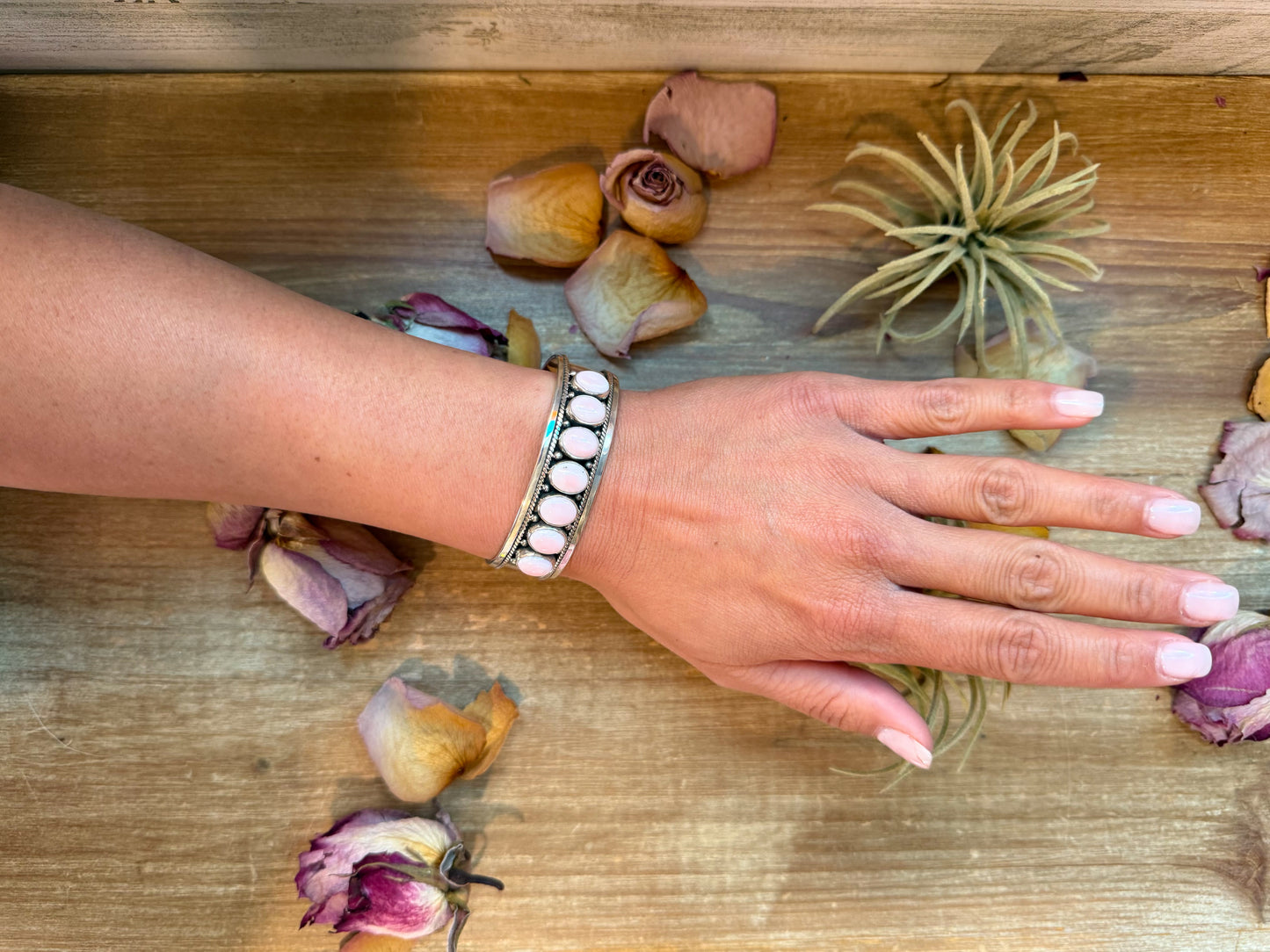 Sterling silver cuff bracelet with pink conch stones, handmade in the USA, adjustable fit