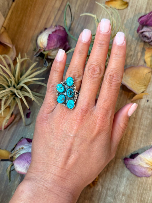 Sterling silver adjustable ring with Kingman turquoise half cluster design, stamped Sterling, handmade in USA