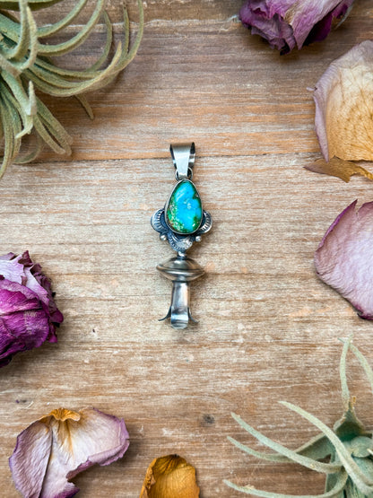 Sterling silver blossom pendant with 8 mm Sonoran Gold turquoise, Native made by artist M with arrow stamp, handmade in USA