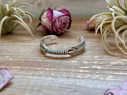 Sterling silver Hudson Feather cuff for 5.5-inch wrist, handmade by Jason Ogg, stamped Sterling, USA made