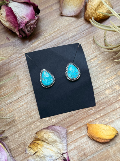 Sterling silver Whitewater Turquoise stud earrings, handmade by artist Jason Ogg, stamped Sterling, made in USA