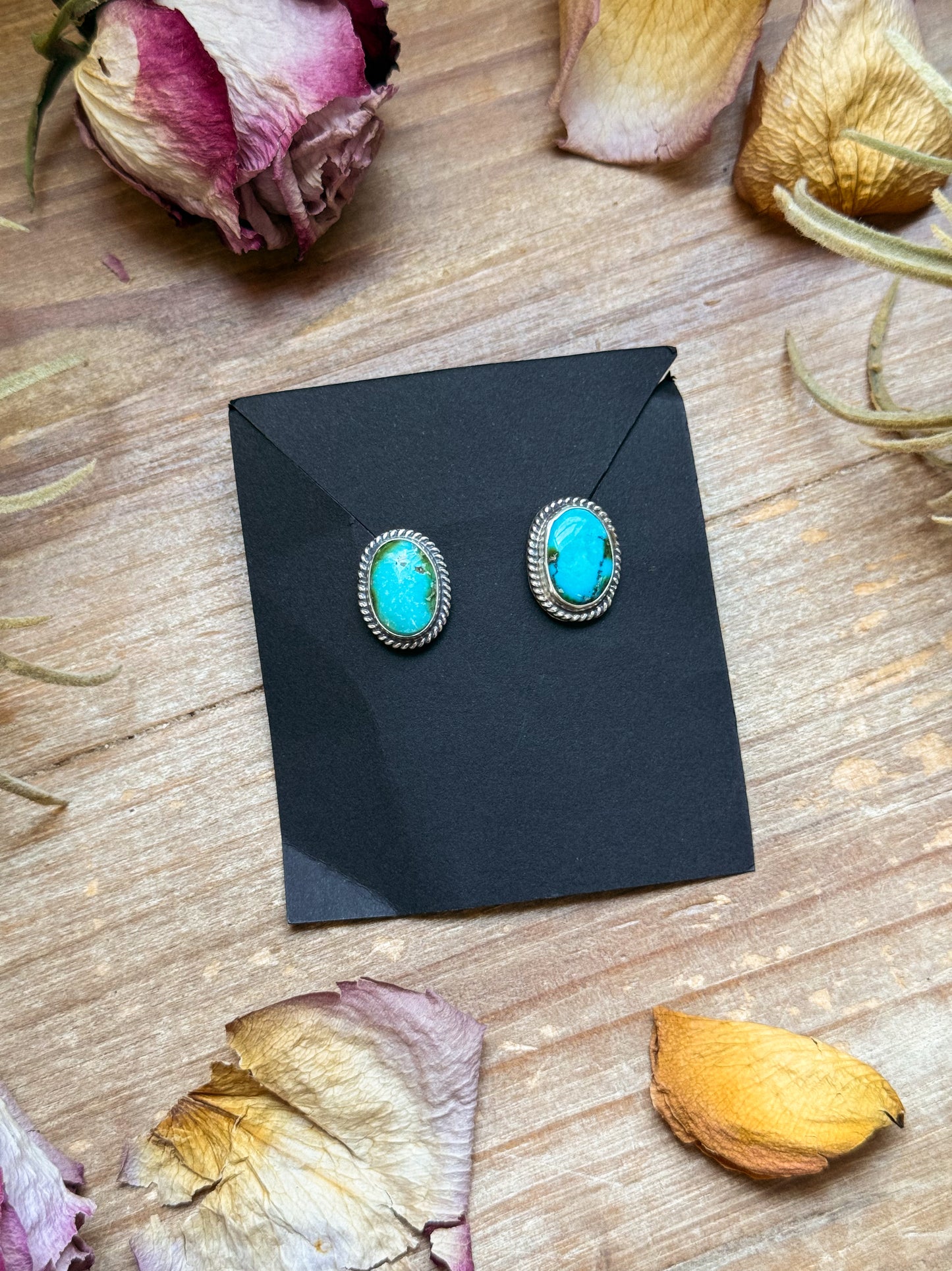 Sterling silver Sonoran Mountain Turquoise stud earrings, handmade by artist Jason Ogg, stamped Sterling, made in USA