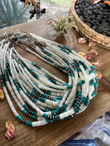 Graduated shell with Navajos turquoise or spiny