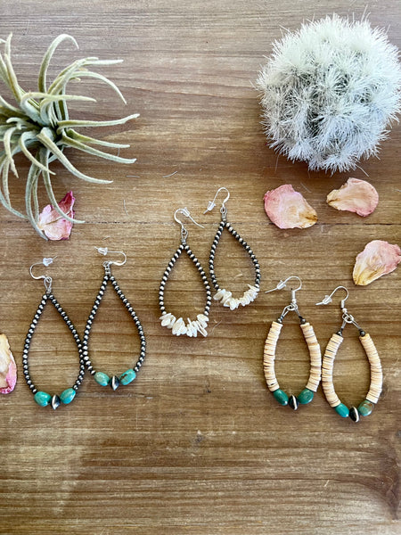 Fresh water pearl earrings with Navajos